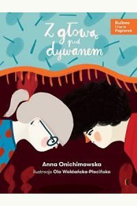 Z głową pod dywanem